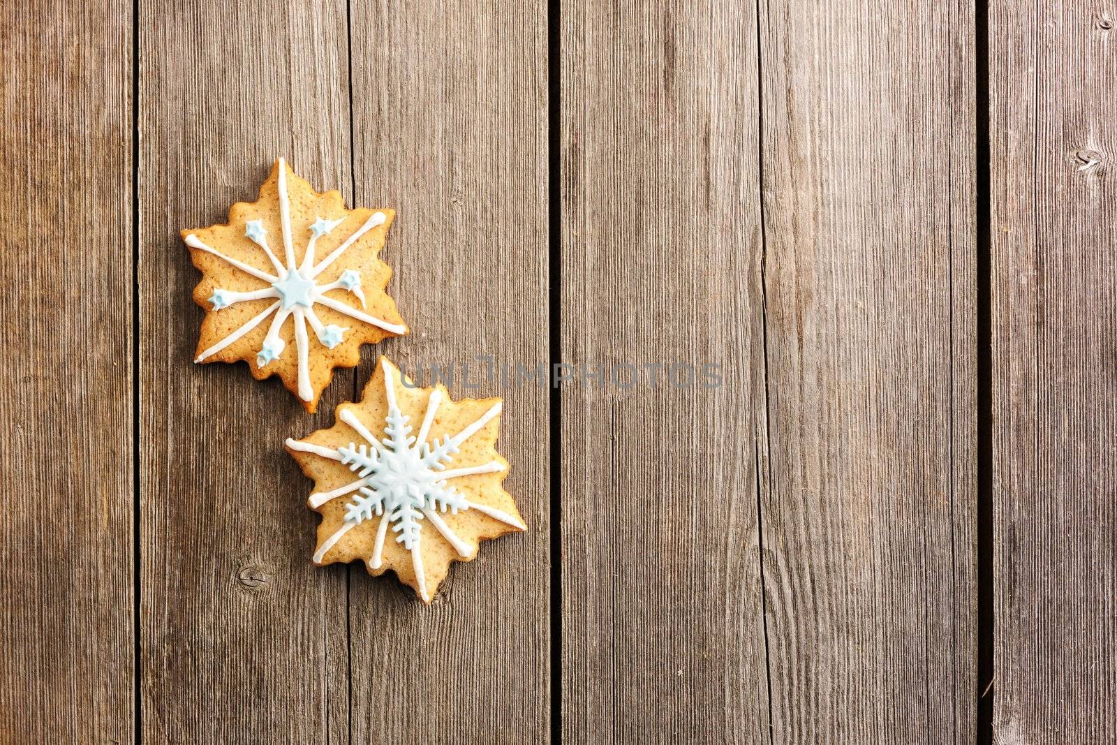 Christmas homemade gingerbread cookie over wooden table