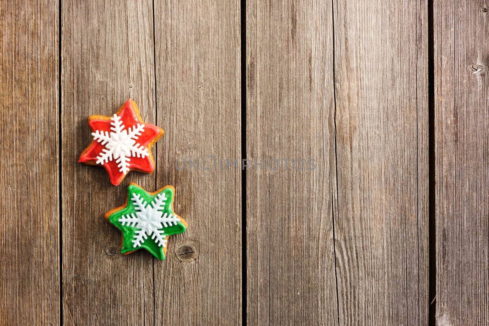 Christmas homemade gingerbread cookie over wooden table