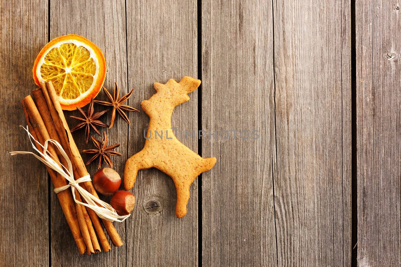 Christmas homemade gingerbread deer over wooden table