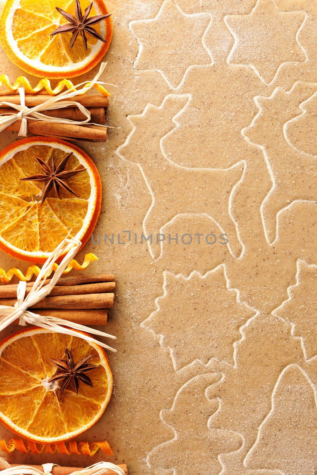 Christmas spices over homemade gingerbread dough