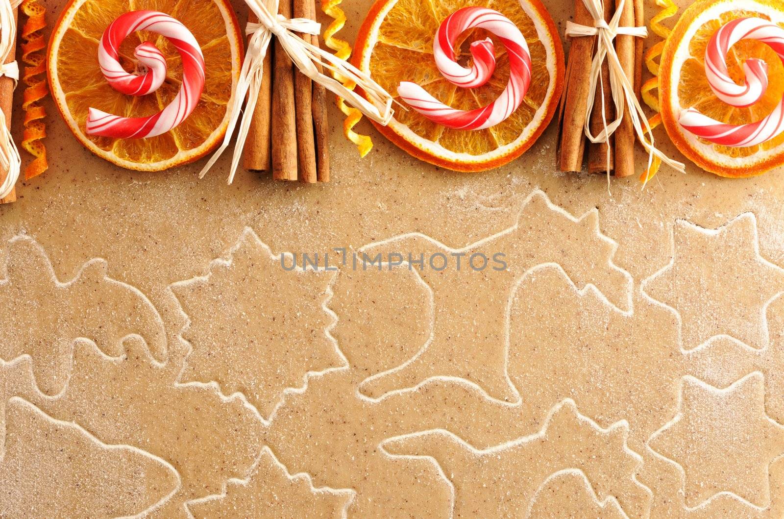 Christmas spices over homemade gingerbread dough