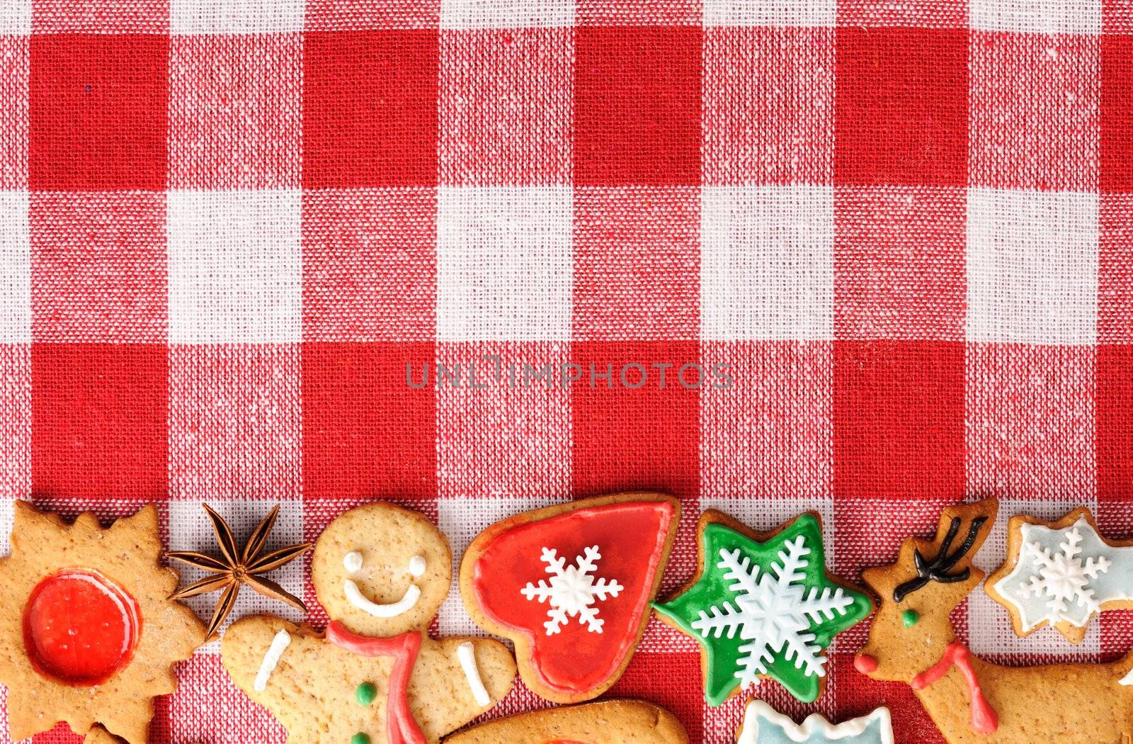 Christmas gingerbread cookies over tablecloth