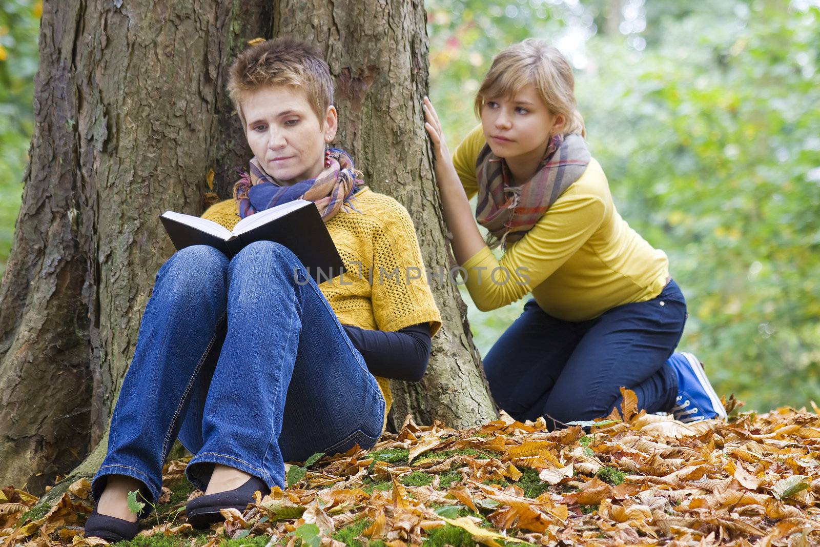 Mother with daughter in the park 