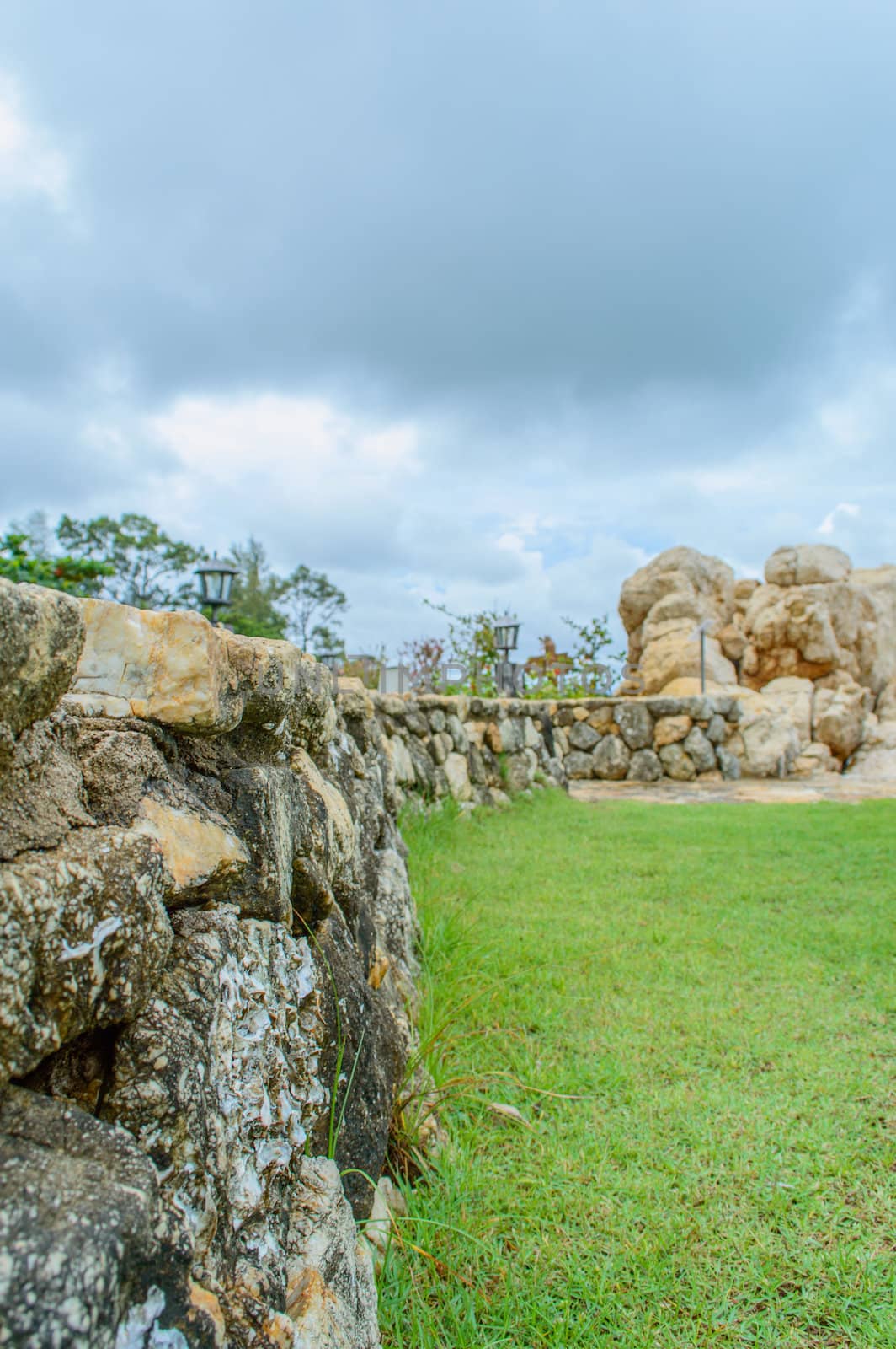 Grass stone wall stone walls, beautiful lawns.