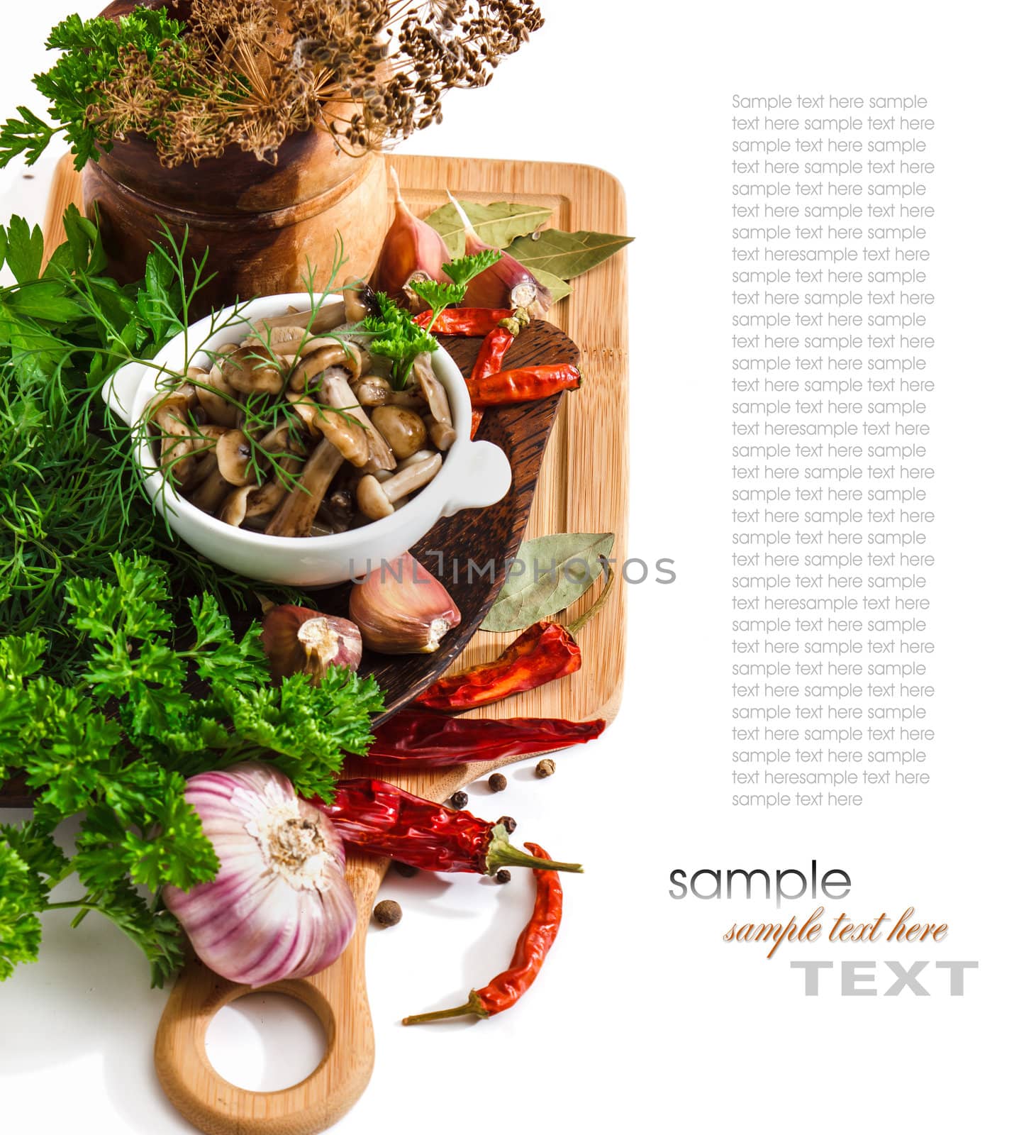 Marinated mushrooms in a cup on the background of a cutting board and spices