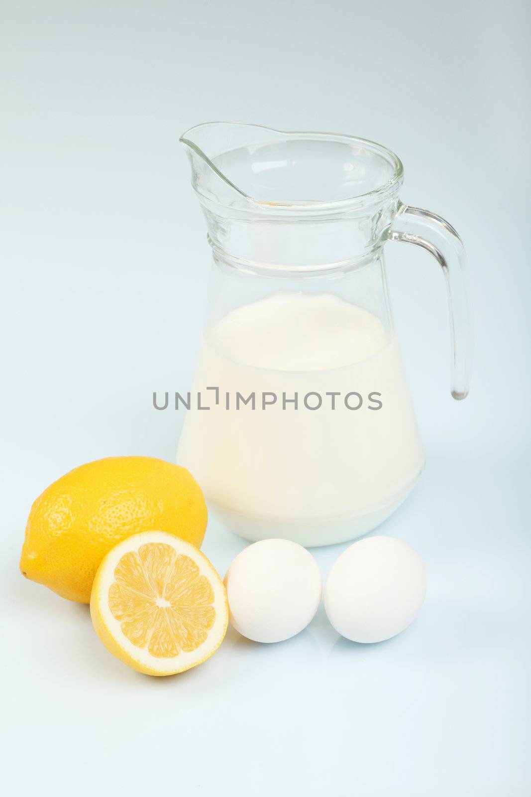 Milk in a glass jar and eggs by sergey_nivens