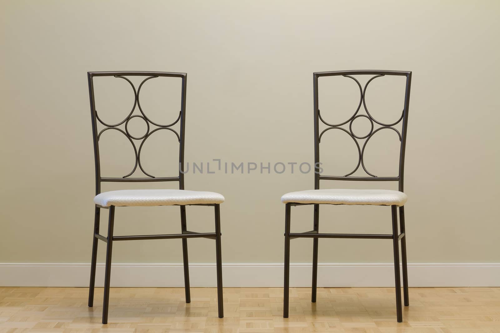 Chairs against wall in a new apartment