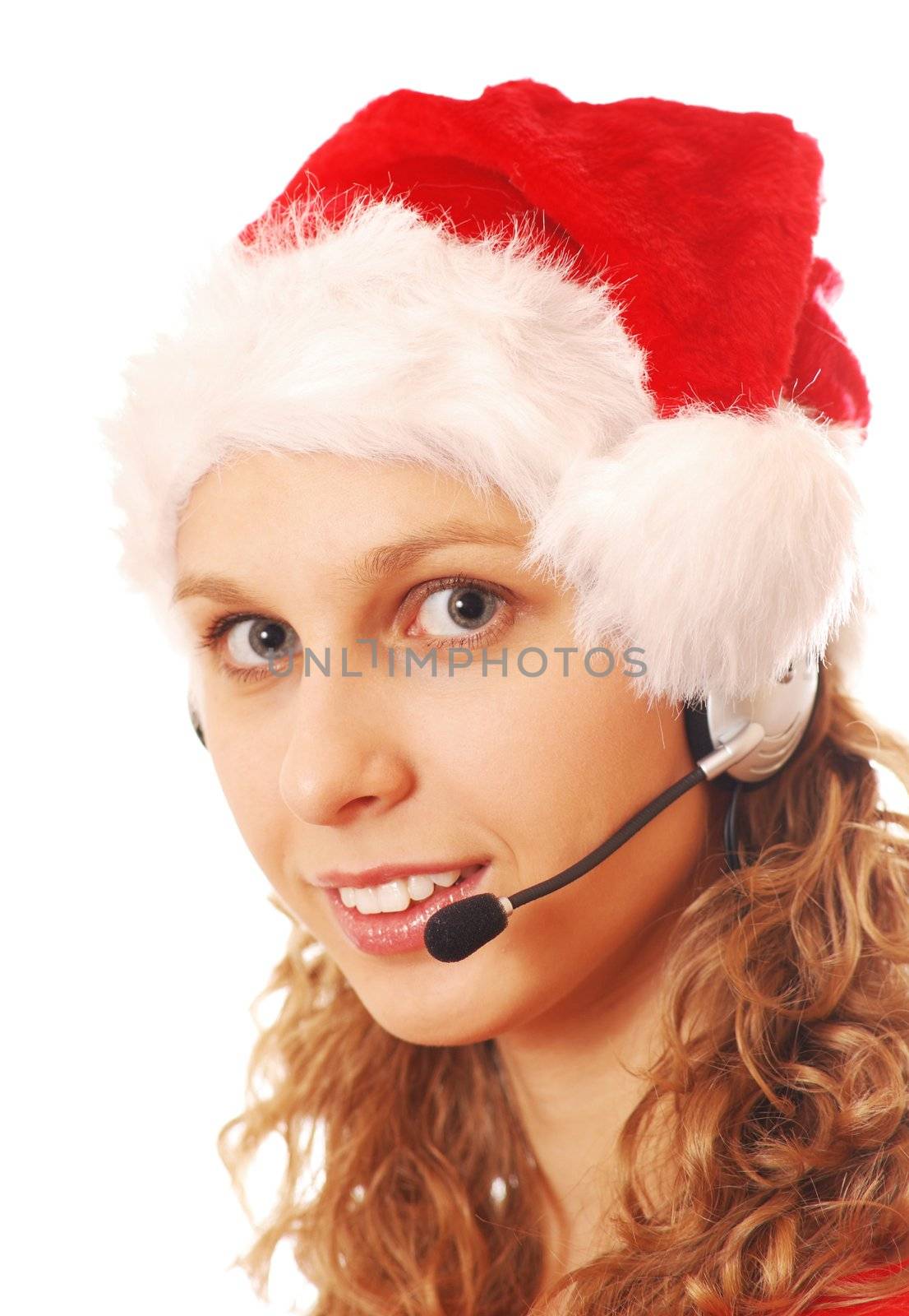 Girl with headset in Santa's hat, isolated on white