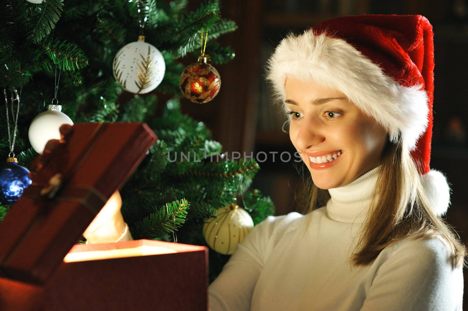 Young woman with Christmas present