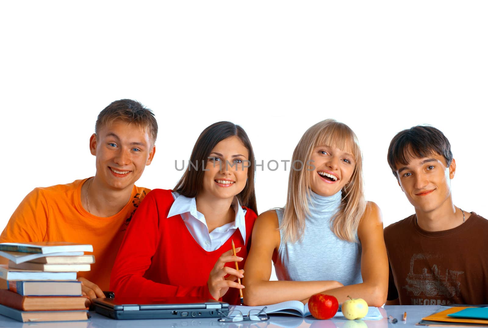 Group of students sit at the desk and smile on white background