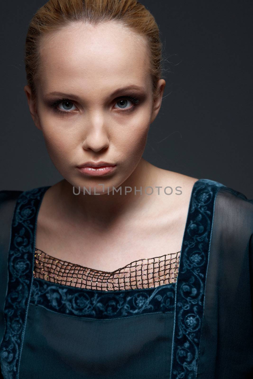 Close-up portrait of a beautiful model in vintage style.