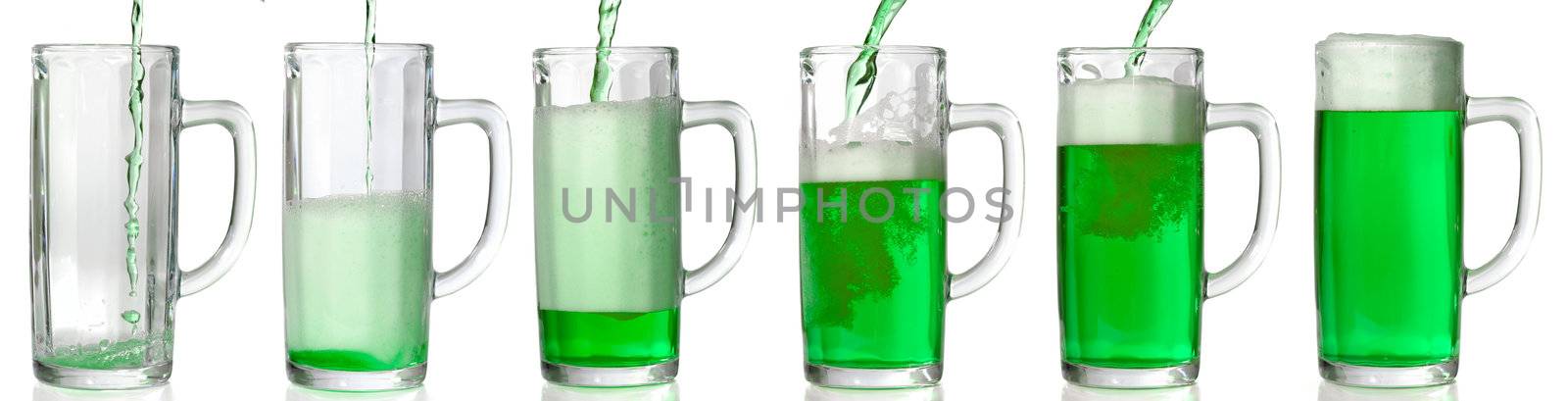 Green Beer mug isolated on white. Pouring green beer in it. 43 Mpxls.