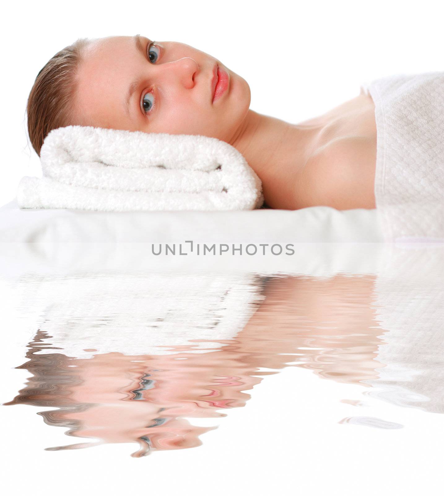 Woman laying on towel by haveseen