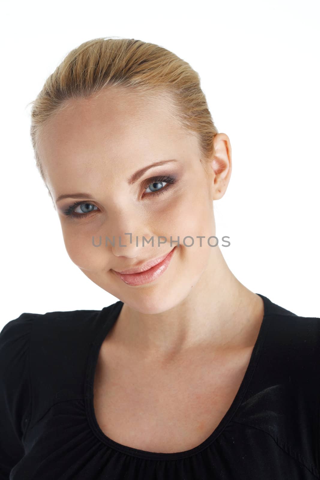 Close-up of blond model smiling in black blouse on white.