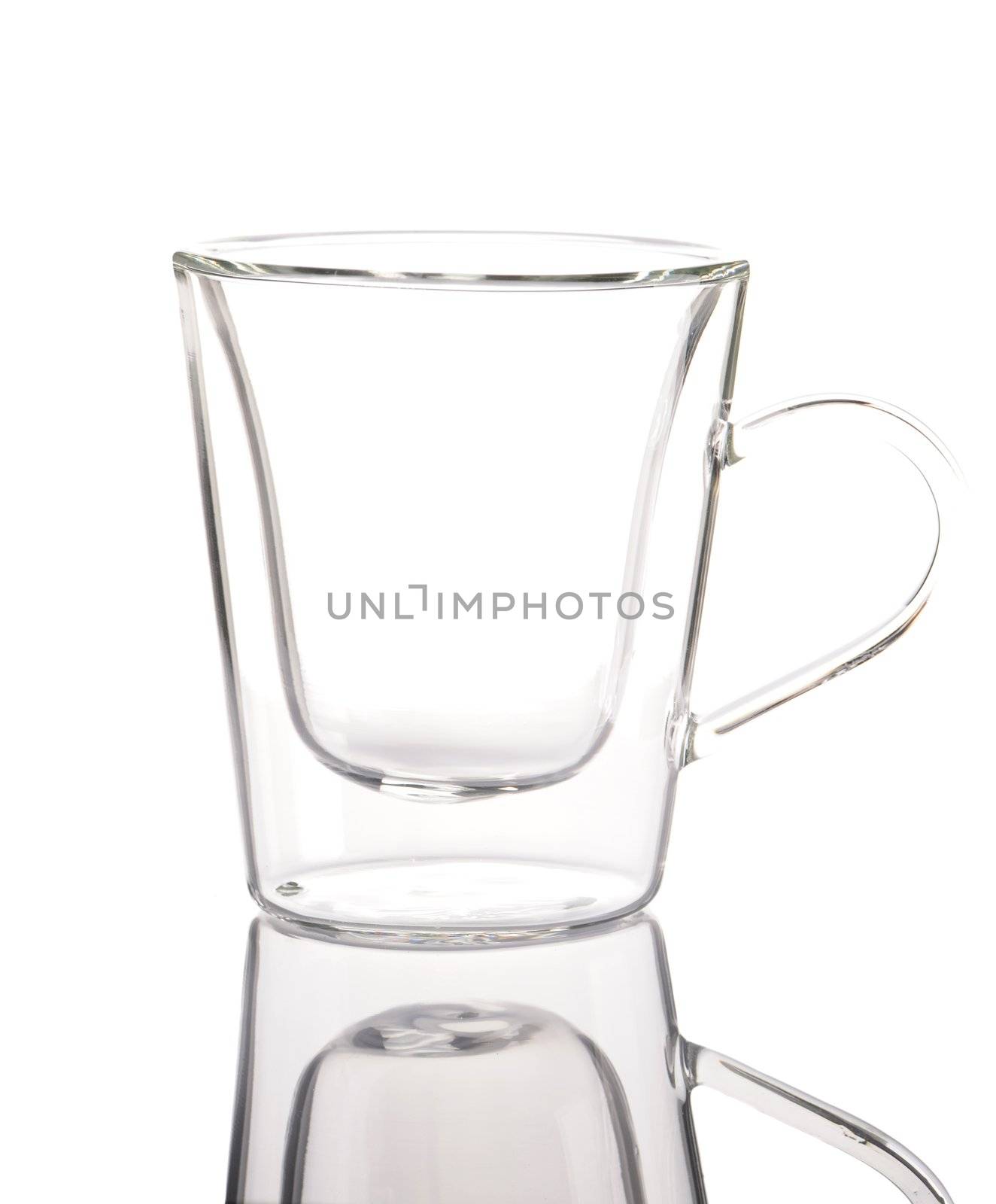 Empty glass isolated on white background with reflection