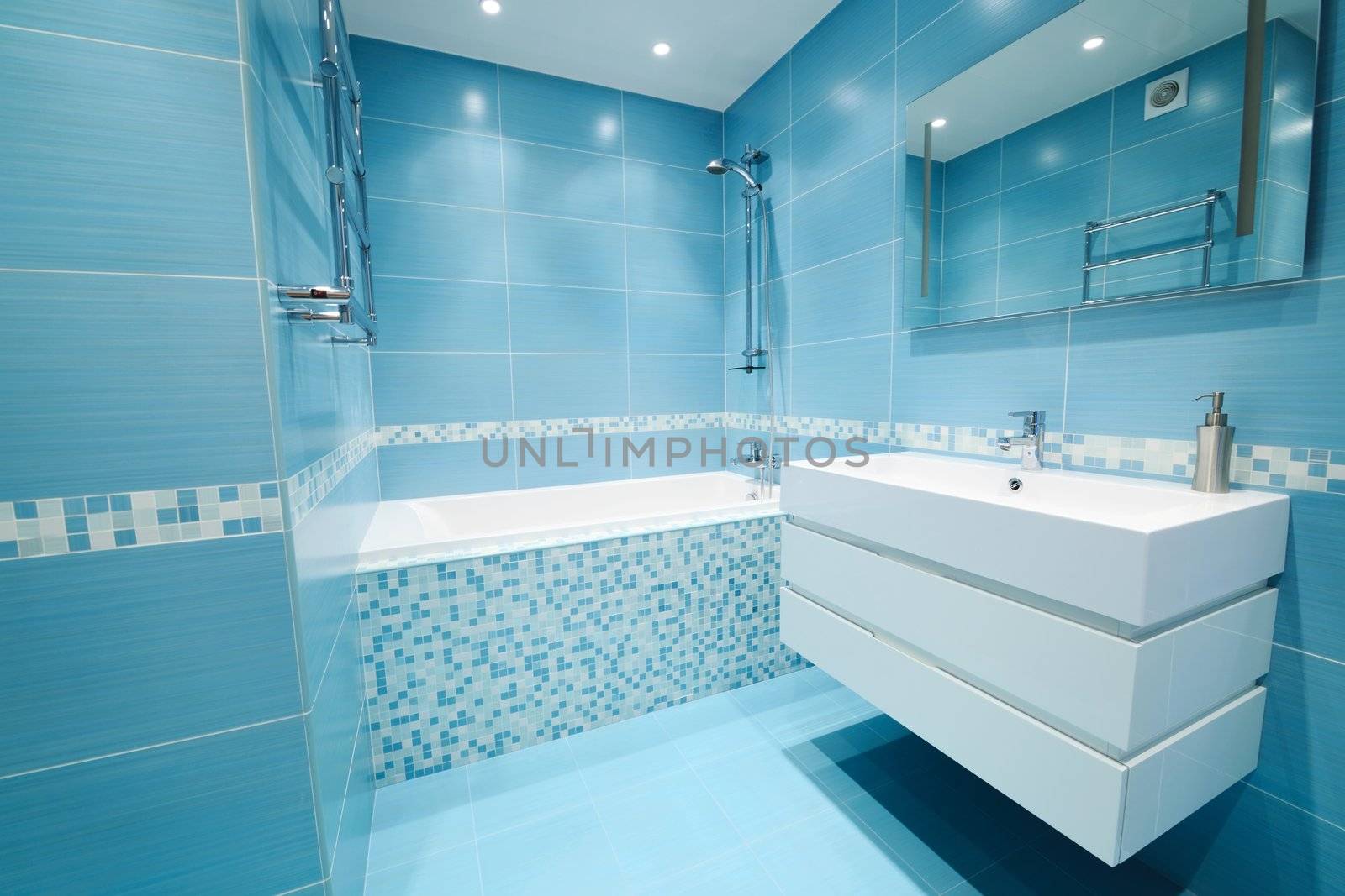 Modern luxury bathroom blue interior. No brandnames or copyright objects. 