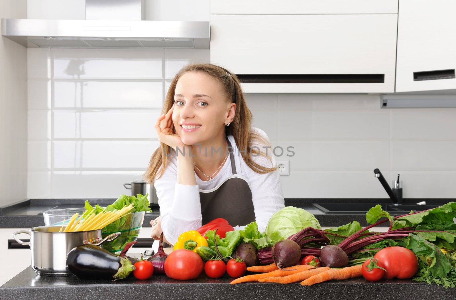 Woman cooking in modern kitchen