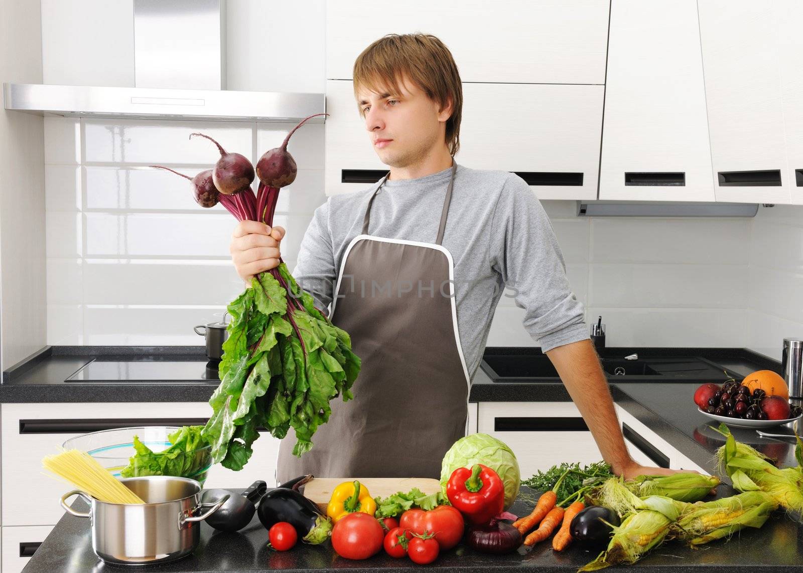 Man cooking in modern kitchen