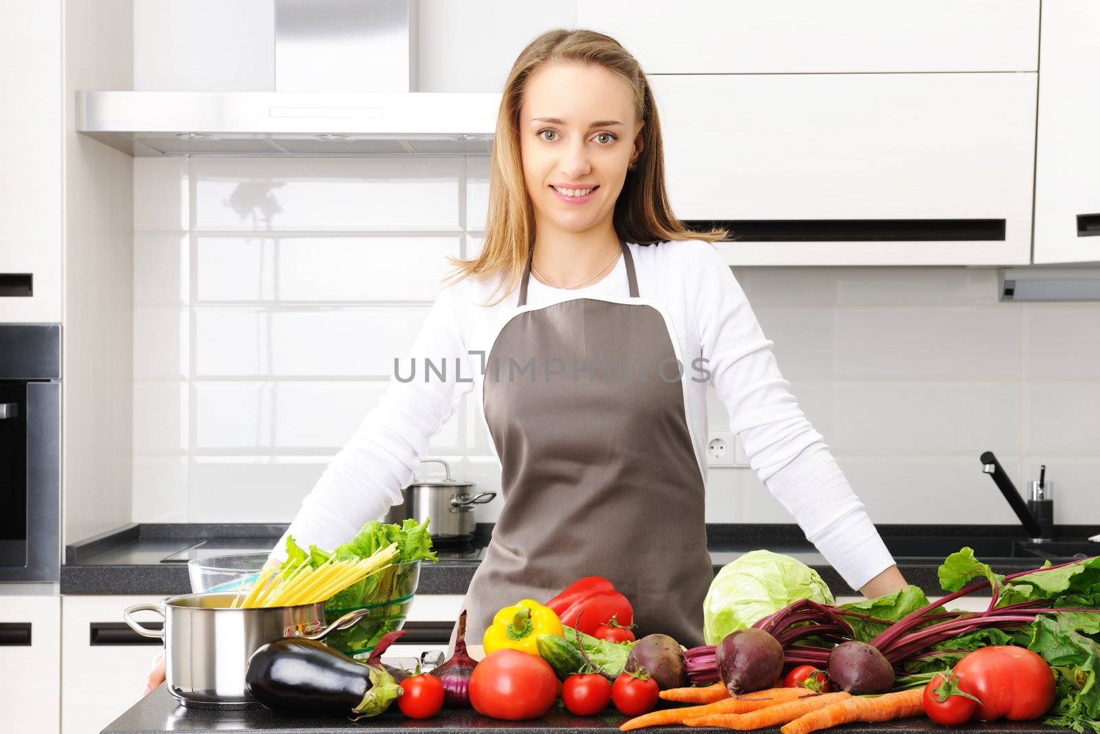 Woman cooking in modern kitchen