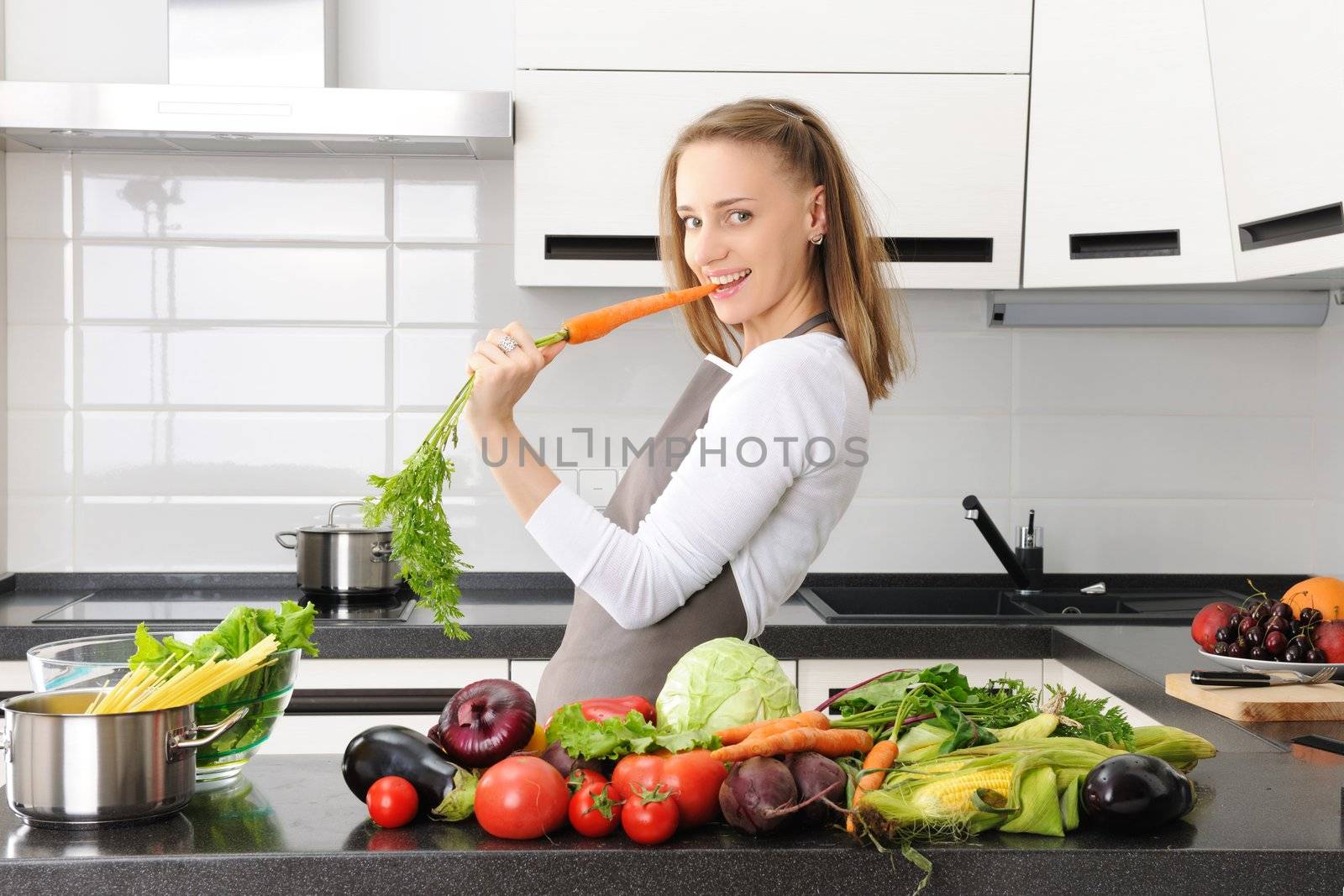 Woman cooking in modern kitchen