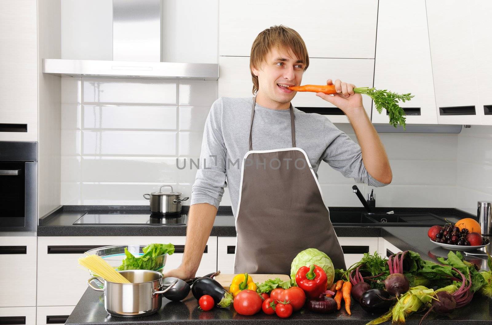 Man cooking in modern kitchen