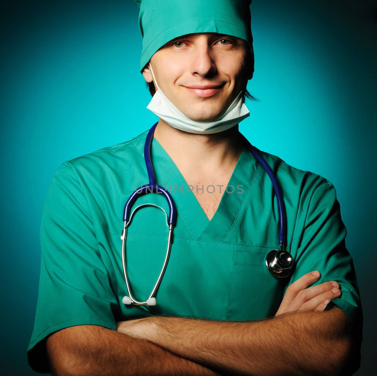 Surgeon with stethoscope over blue background