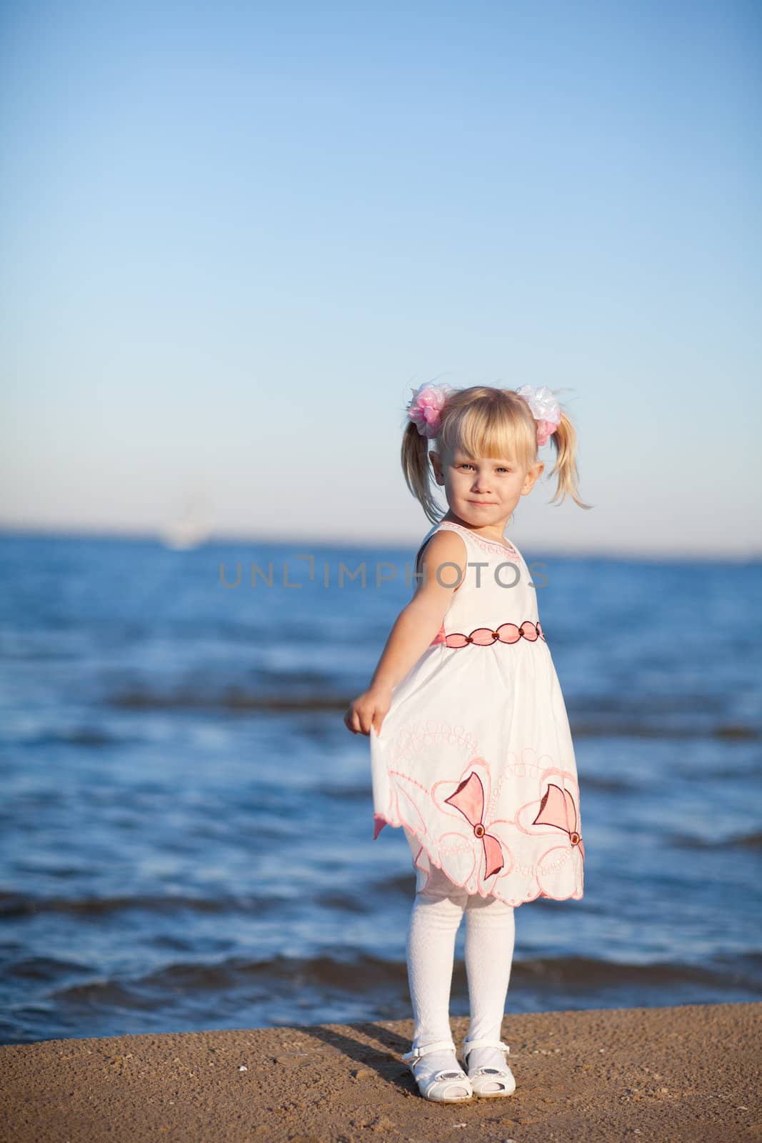 small girl on the beach