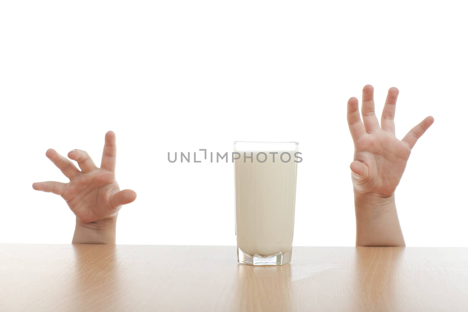 two hands and glass of milk by vsurkov