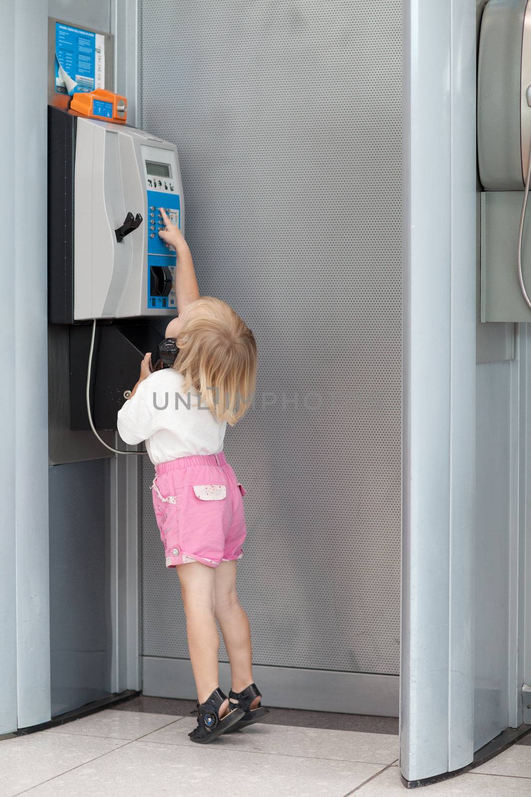 small child calling the phone 