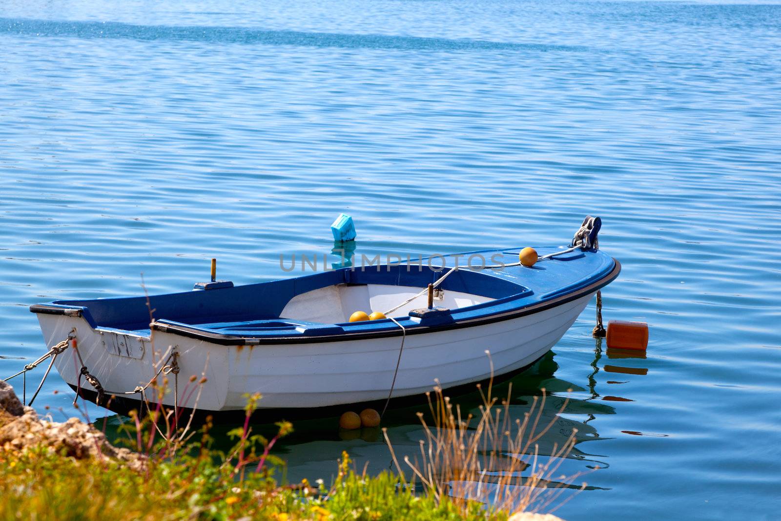 One fishing boat floating on the water