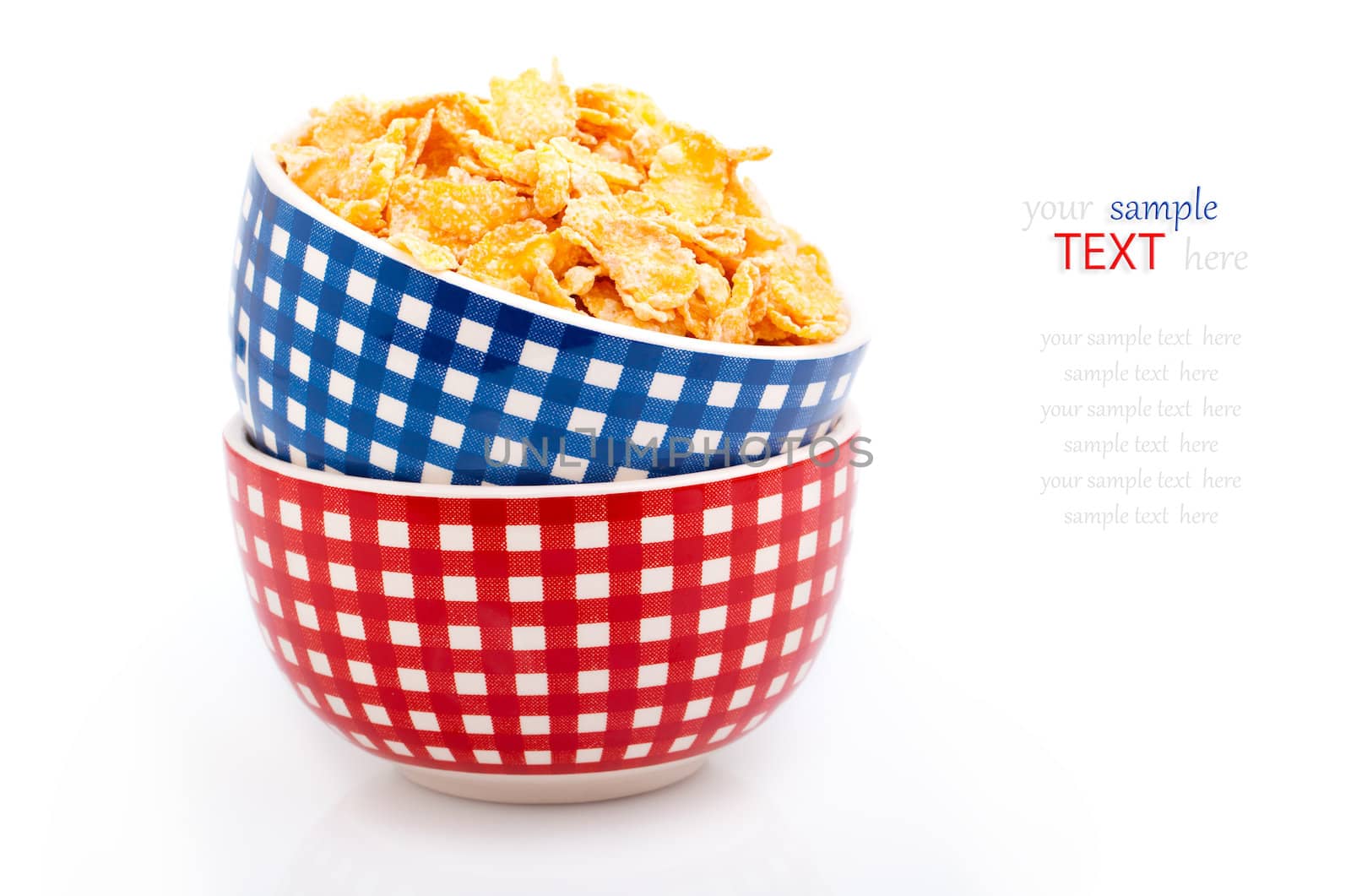 Cornflakes in a porcelain bowl, isolated on white background. with with room for text
