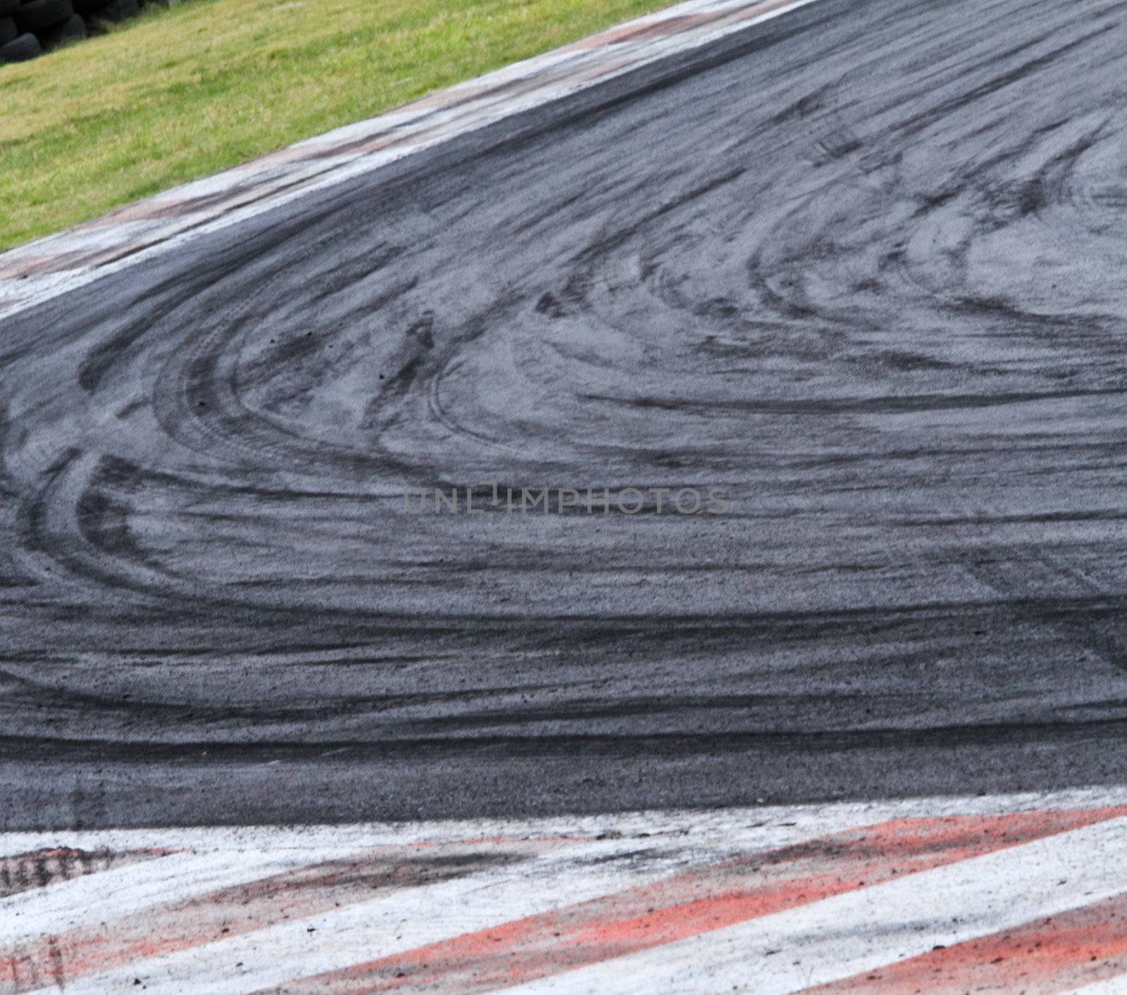 Background with tire marks on road track