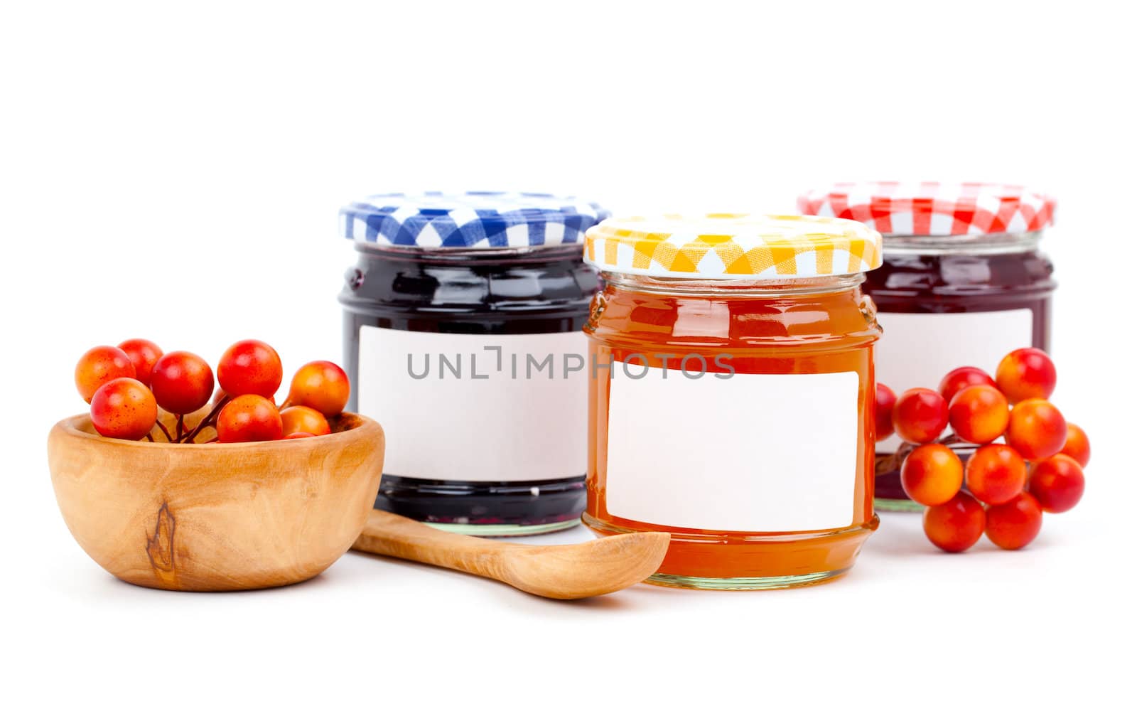 jars of marmalade with berry, isolated on white background