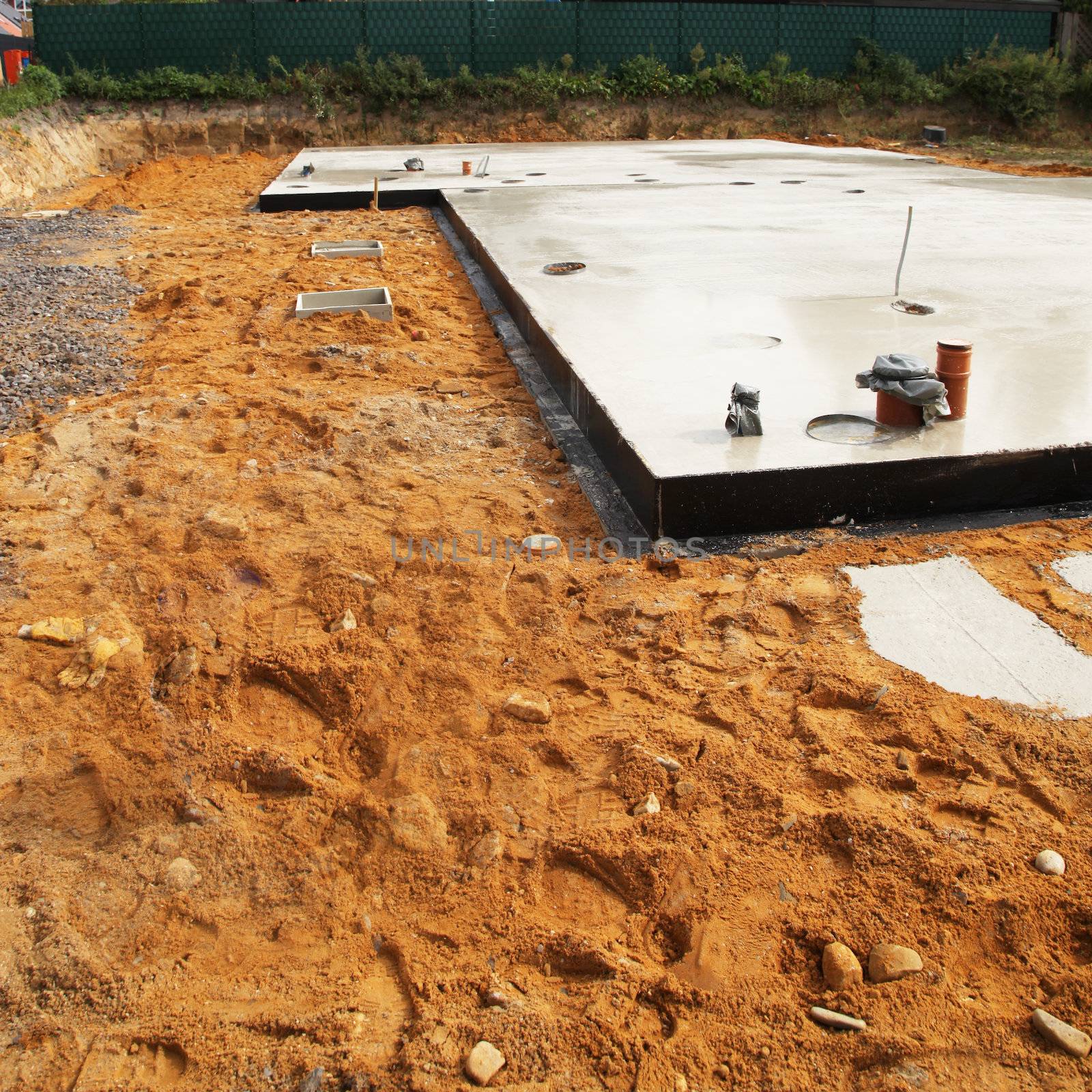 Floor foundation surrounded by soil for new house. Floor foundation surrounded by soil for new house.