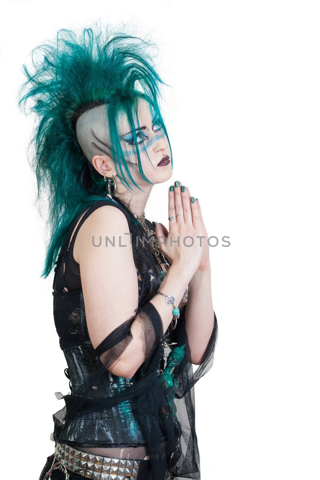 green haired postpunk girl praying on white background