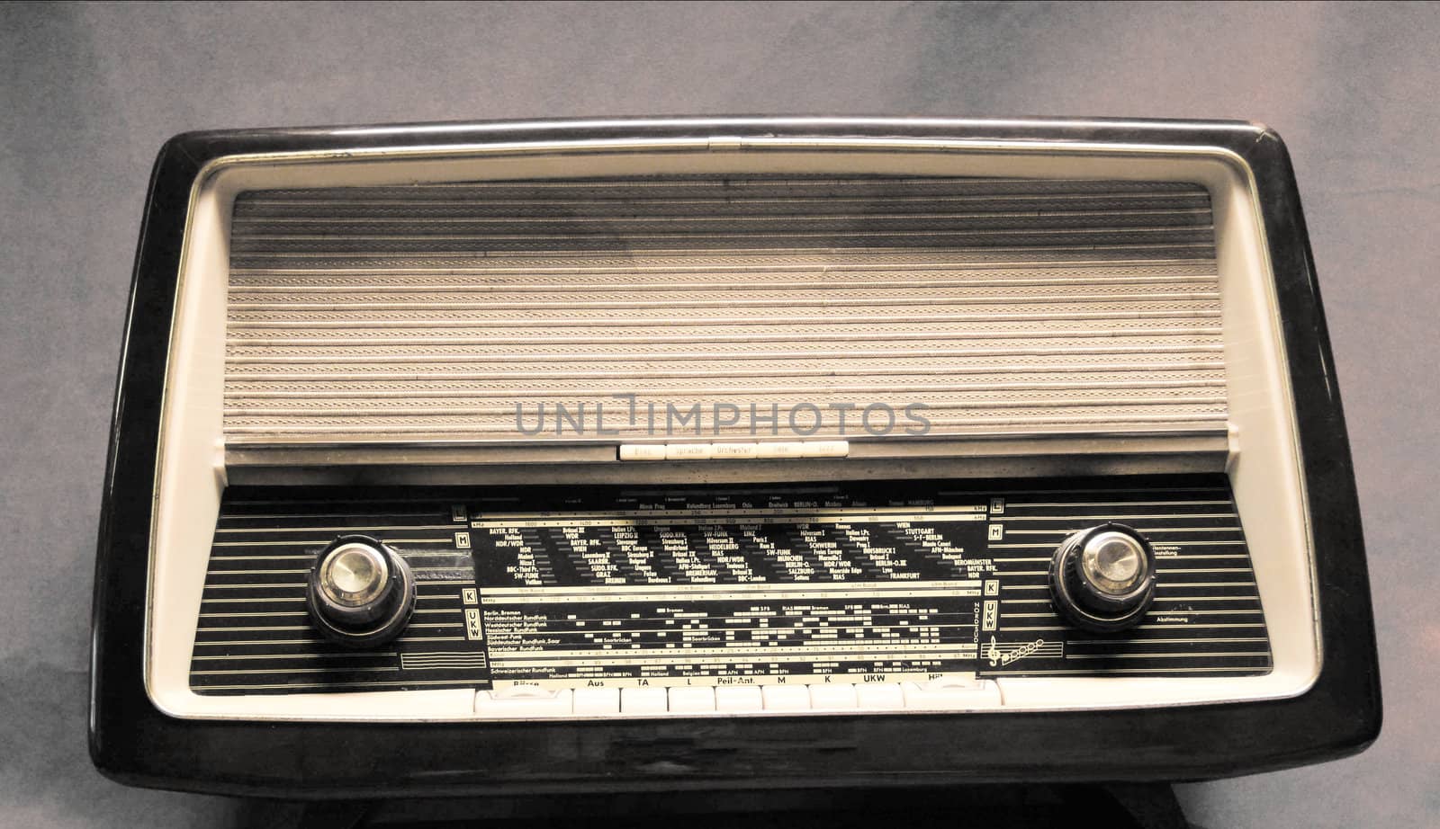 antique radio on vintage background by rainyrf