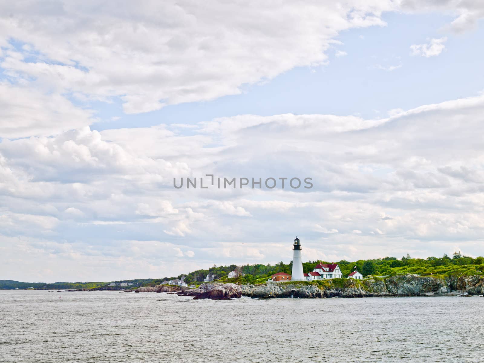 Lighthouse and Cloudy Sky