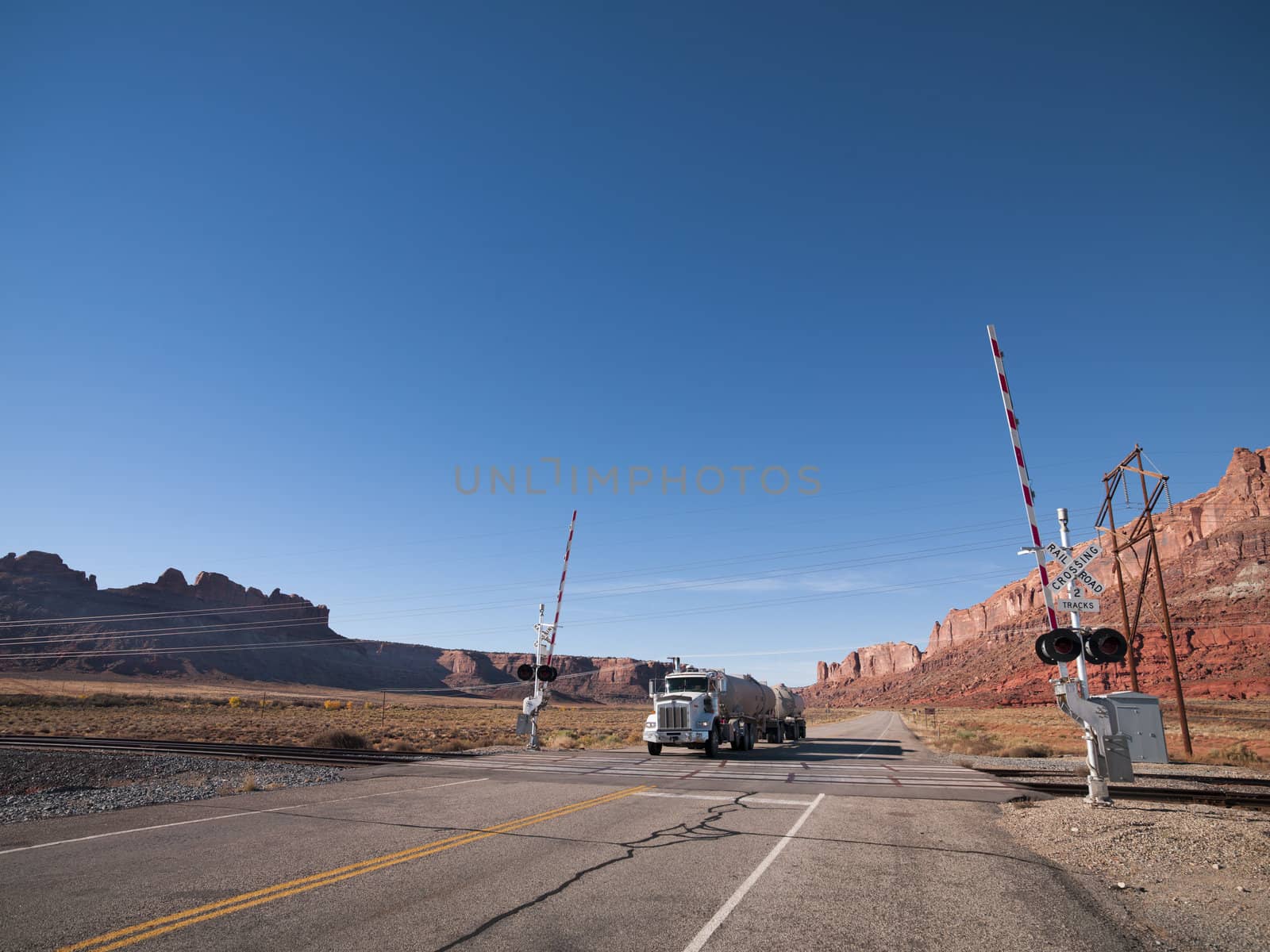 truck at railroad crossing by rusuangela