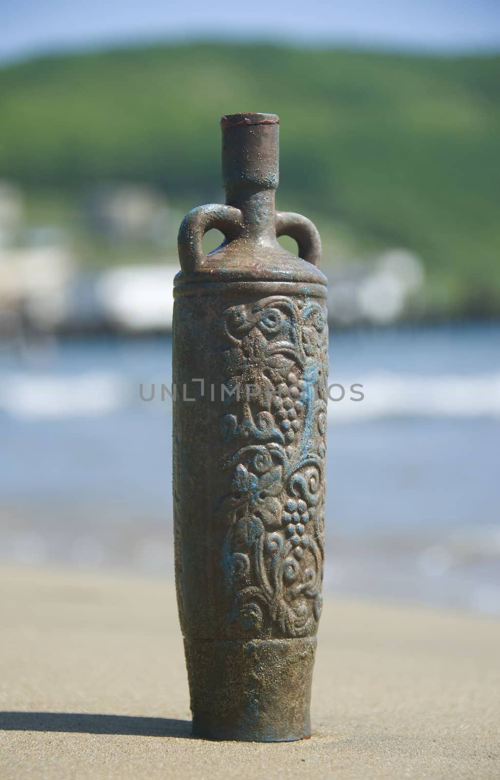 amphora in the sand on the beach