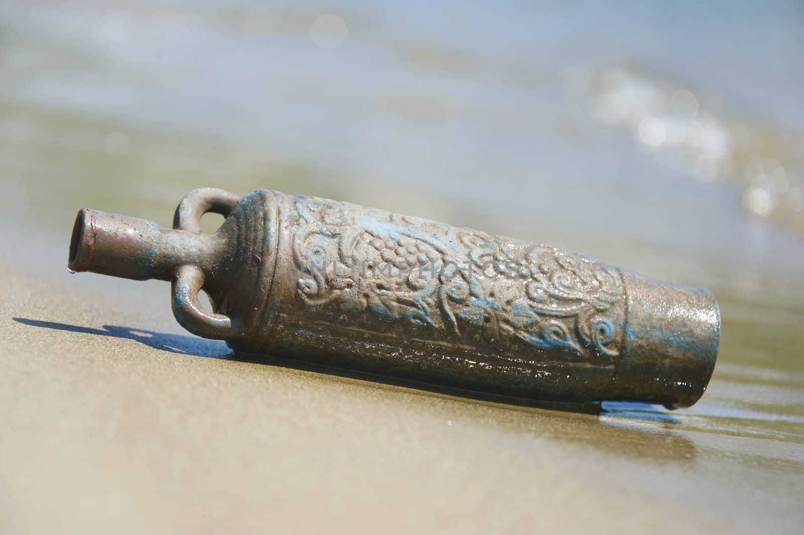 amphora in the sand on the beach