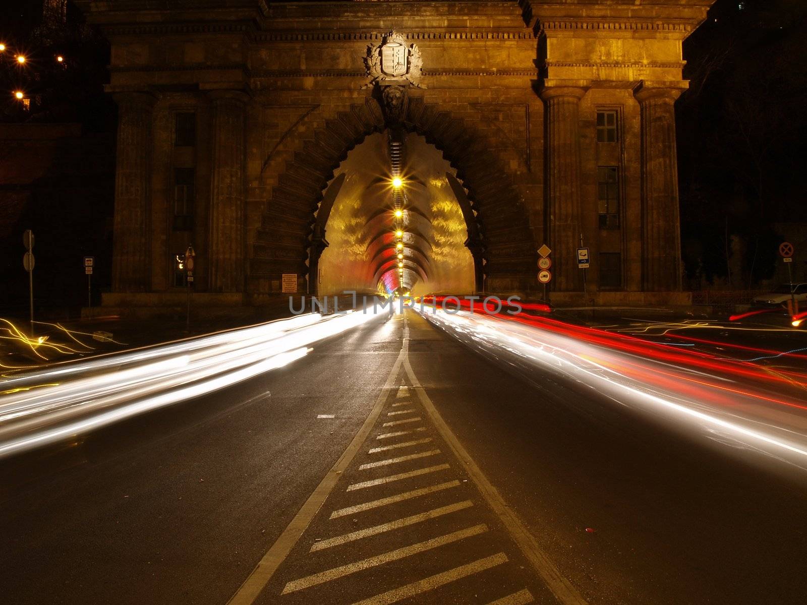 Exit of a tunnel with cars