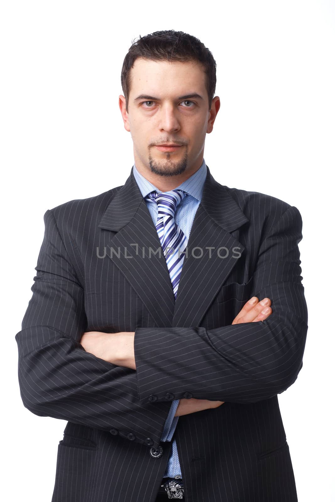 Portrait of a confident mature  business man with hands folded on white background 