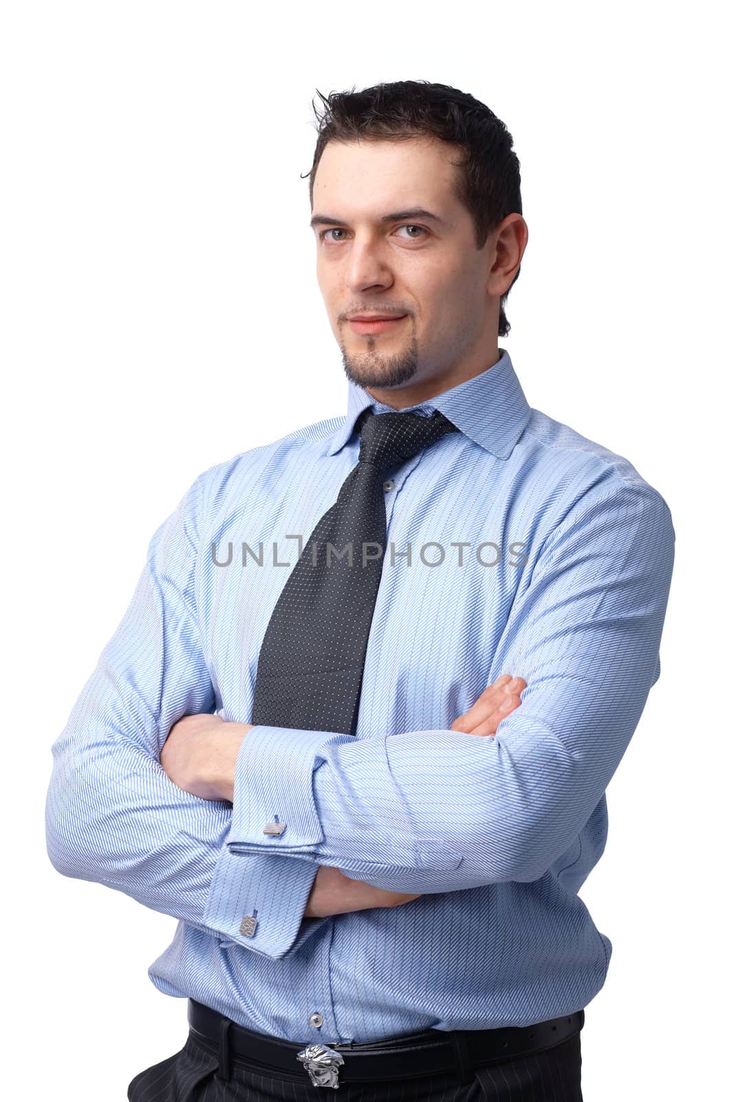   Portrait of successful businessman, smiling with his hands folded over white background. 