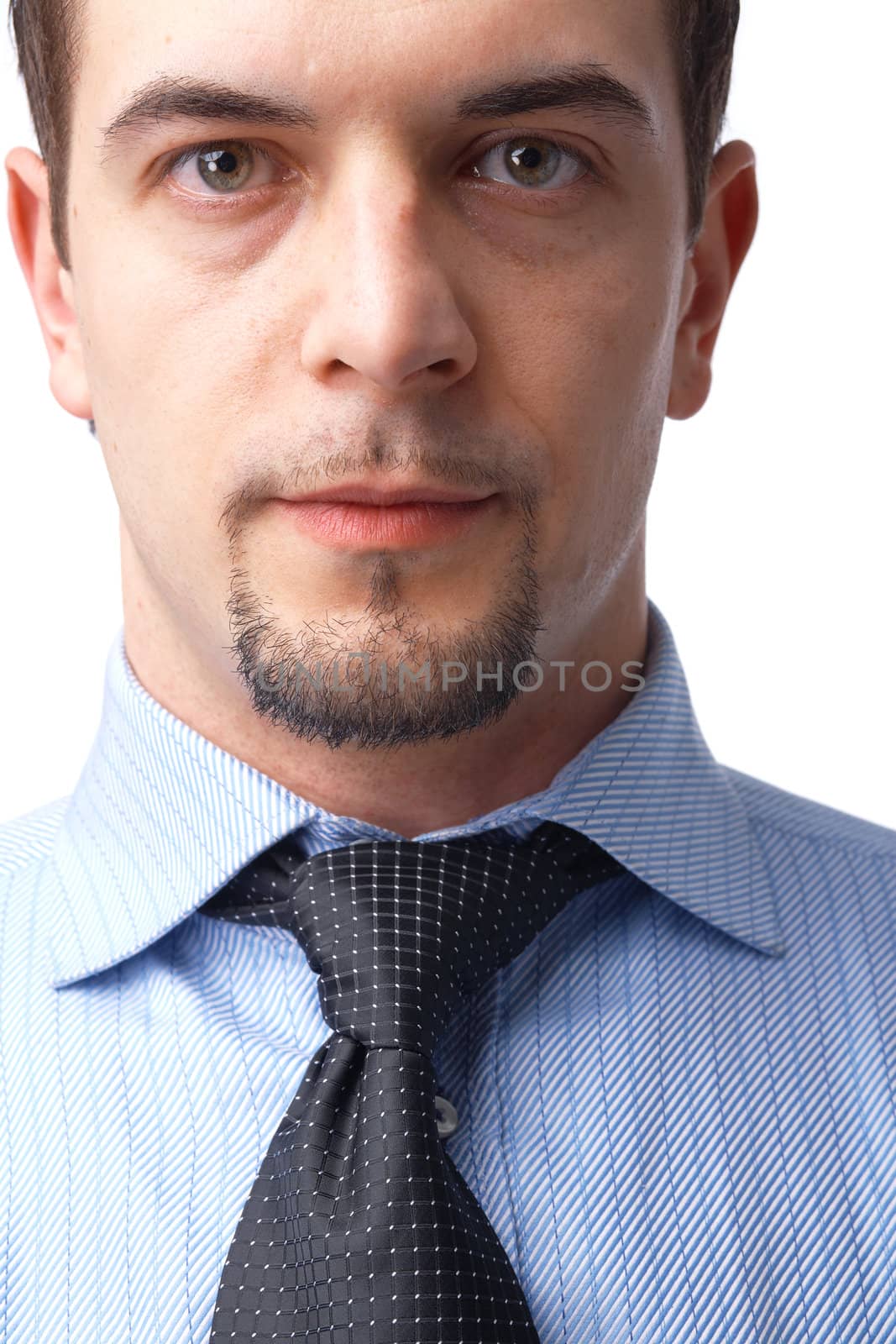 Close-up portrait of a businessman  over white background.