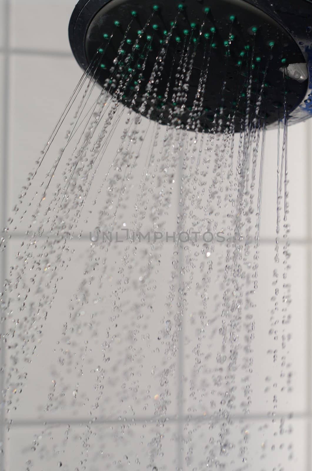 water drops falling from a shower indoors