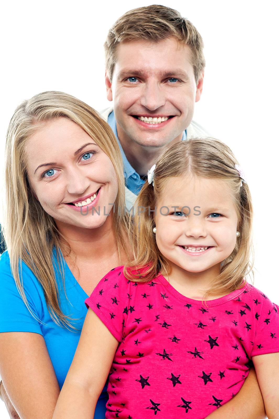 Parents posing with cute smiling daughter. Looking at camera. Over white background