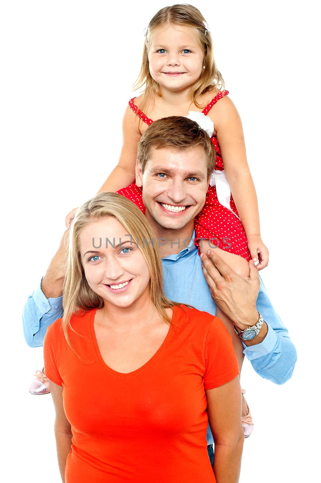 Portrait of cheerful family of three having fun. Facing camera and smiling