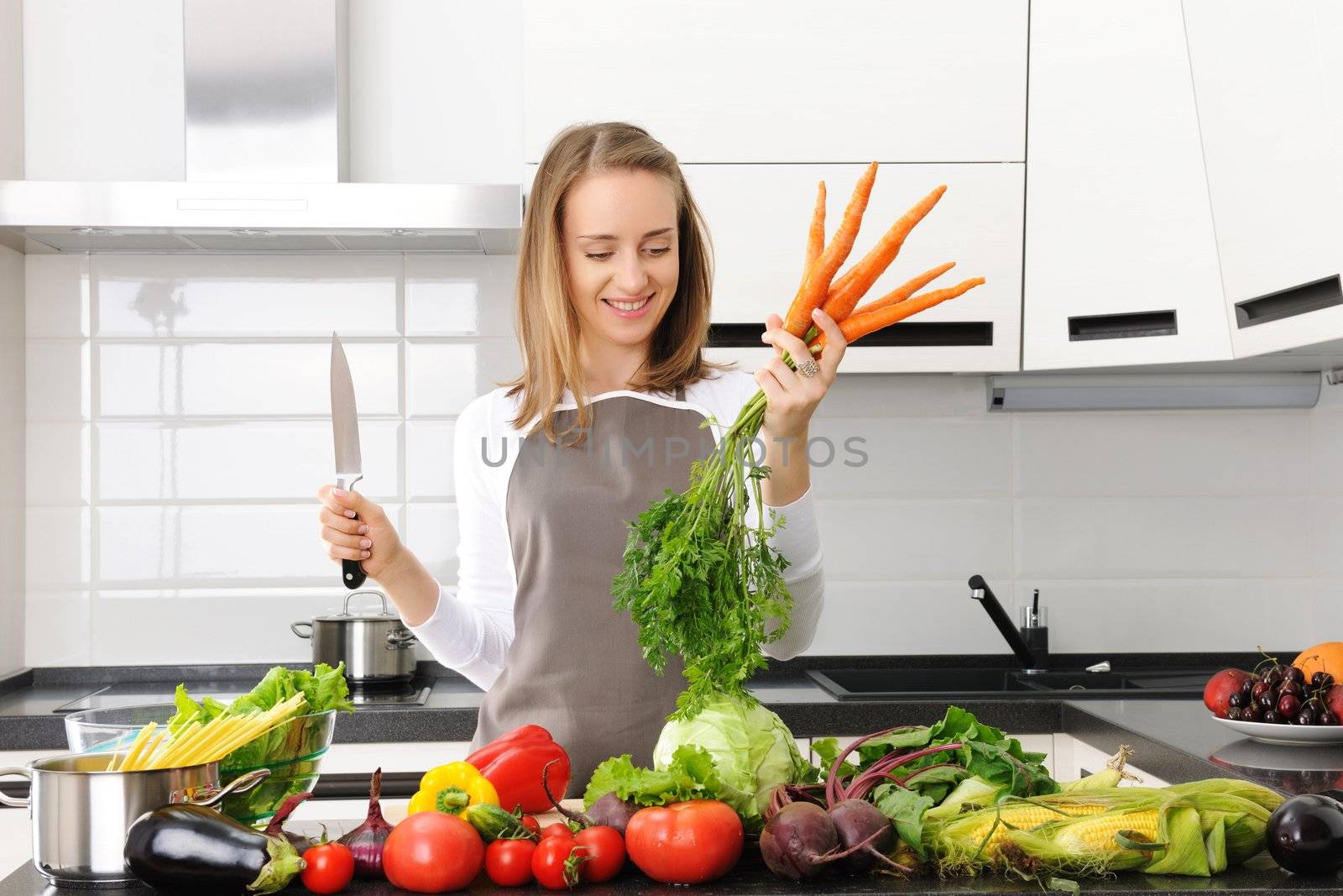 Woman cooking in modern kitchen