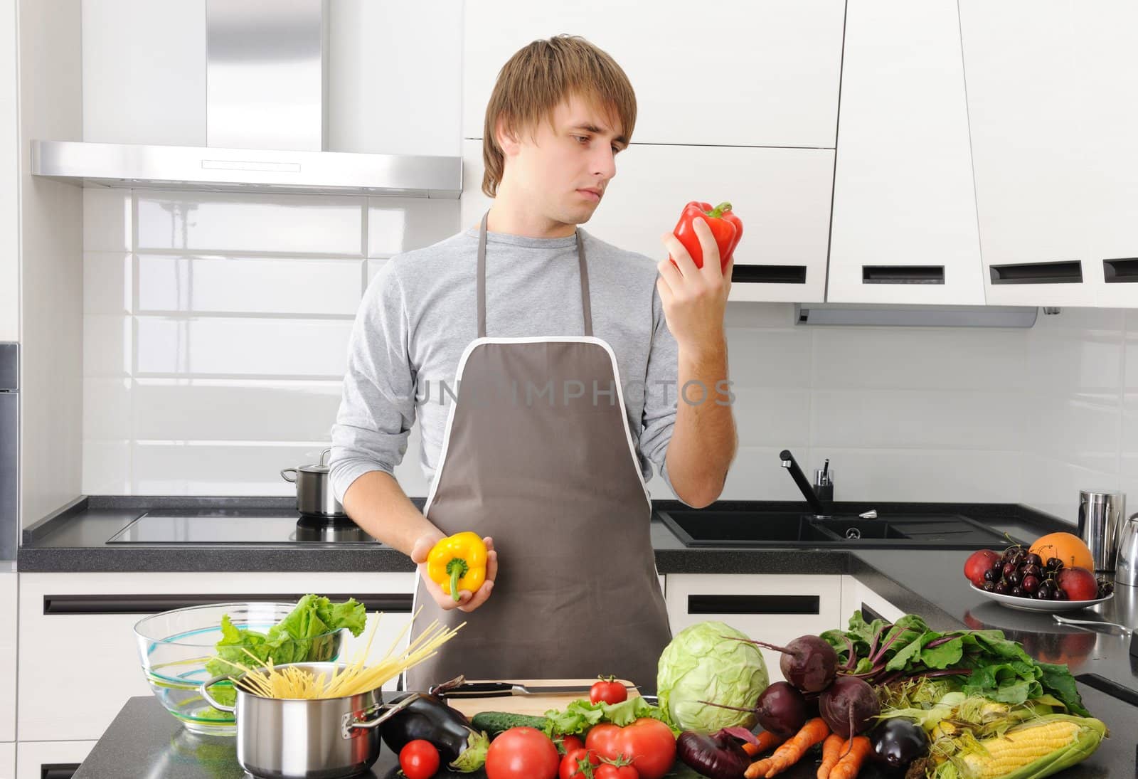 Man cooking in modern kitchen