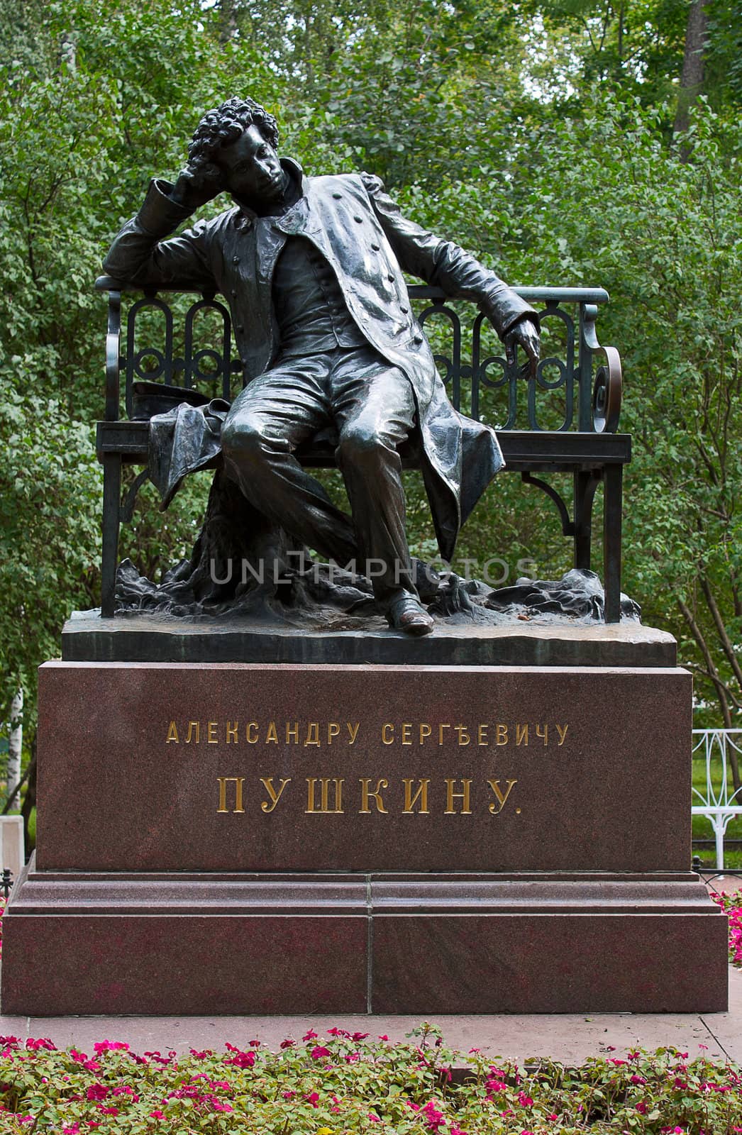 Bronze monument to Pushkin in  park of Peterhof, Russia.
